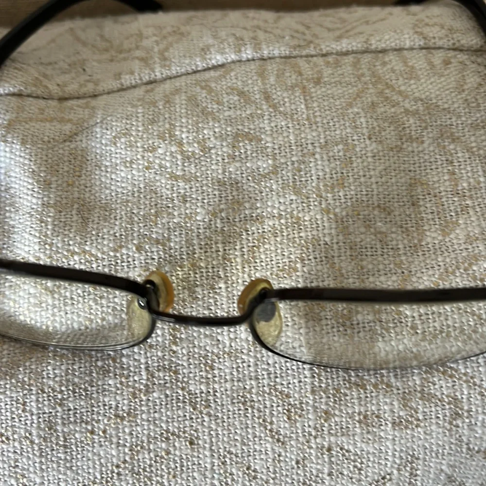 - Dolce and Gabbana black wire frame glasses